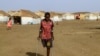 Picha hii inaonyesha watoto wakiwa katika kambi ya watu waliohamishwa kwenye makazi yao katika jimbo la kusini mwa Sudan la Gadaret, Machi 20, 2024. Picha ya AFP